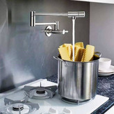 پرکن قابلمه روی اجاق گاز